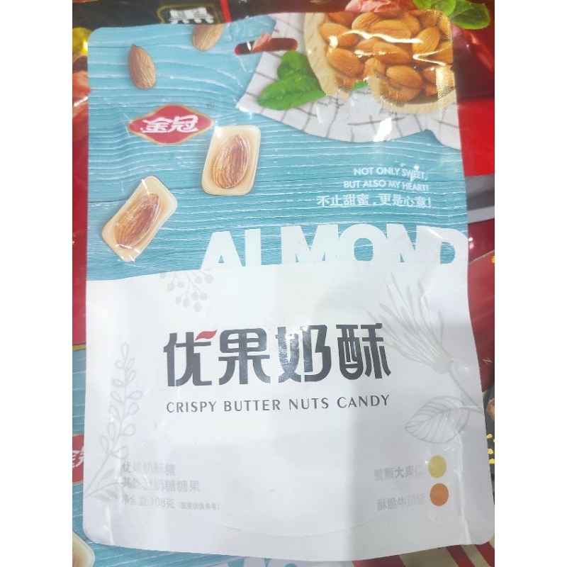 

Golden crown almond butter crispy candy 108gr cemilan permen imlek sincia