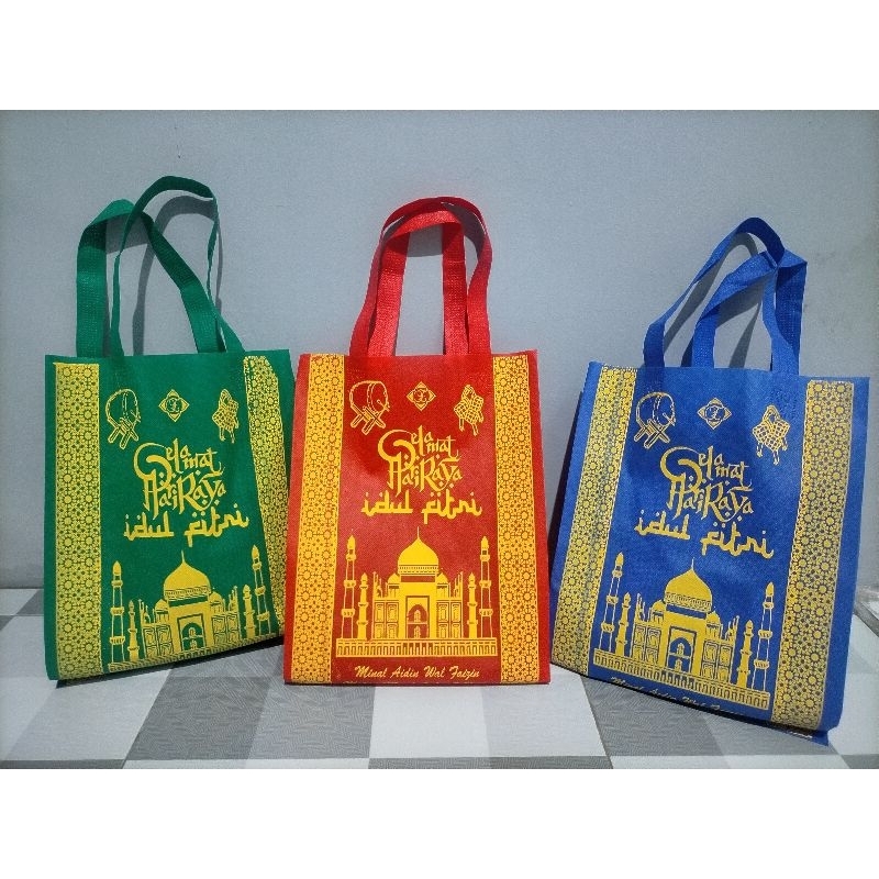 

1 lusin isi 12 pcs Tas press parcel lebaran idul fitri
