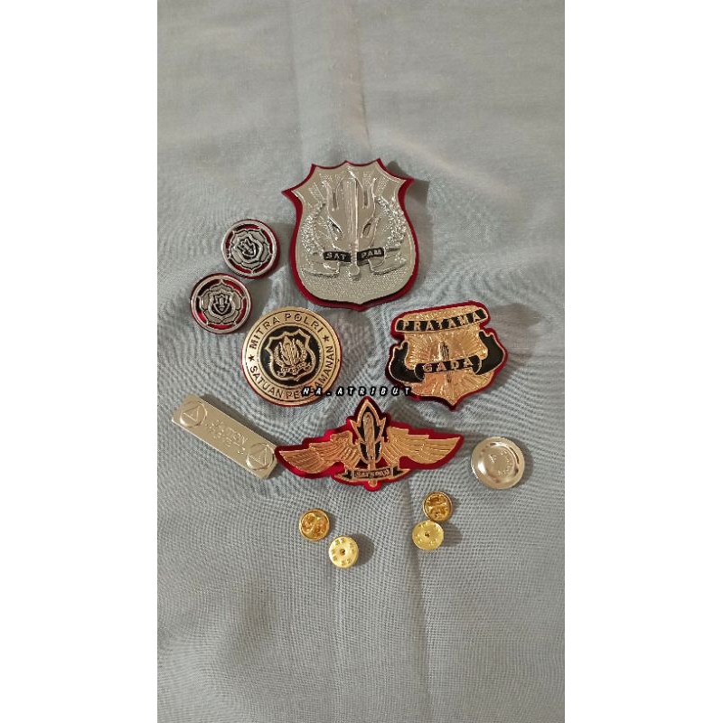 PIN GADA PRATAMA MITRA POLRI MONOGRAM WING SATPAM DAN KEWENANGAN