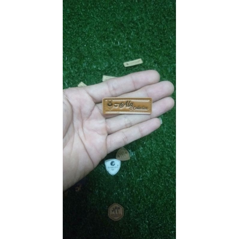 label kulit sintetis buat baju hijab dll