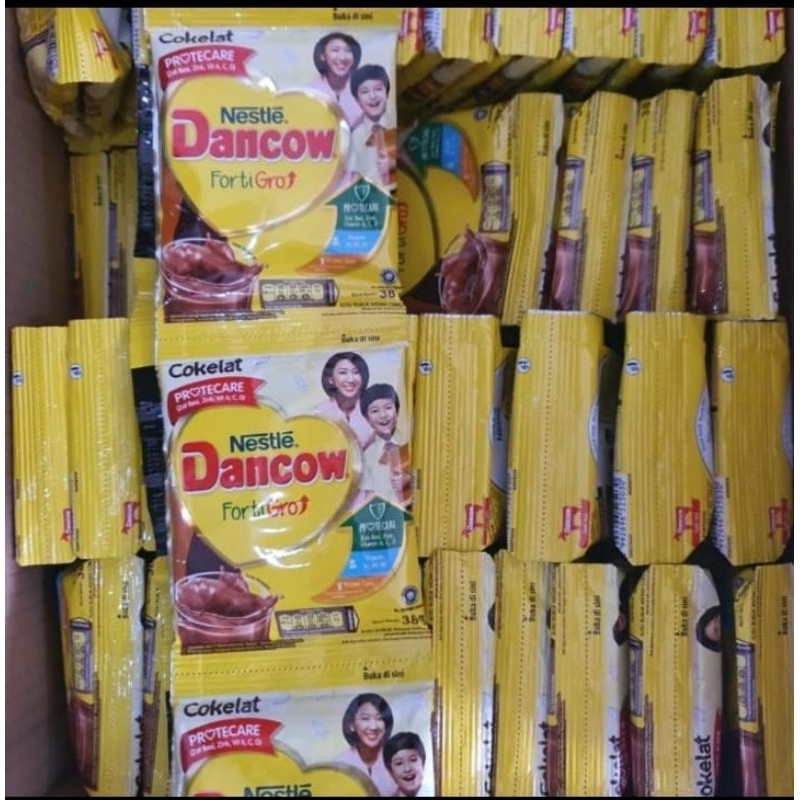 

Susu Dancow coklat sachet 1 renceng isi 10 pcs