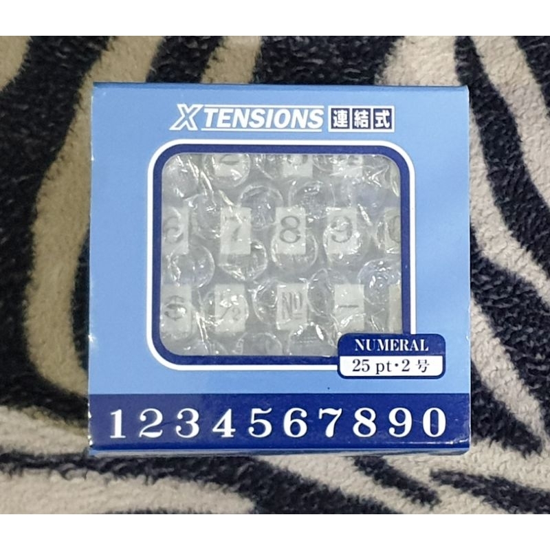 

XTENSIONS NUMERAAL 25PT