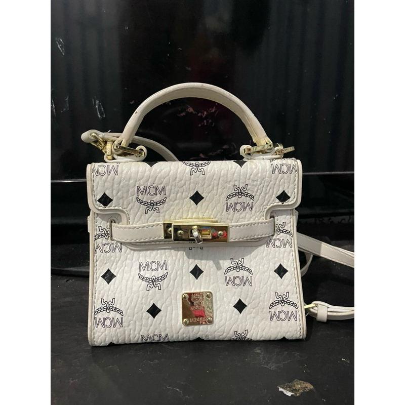 mcm mini sling bag preloved