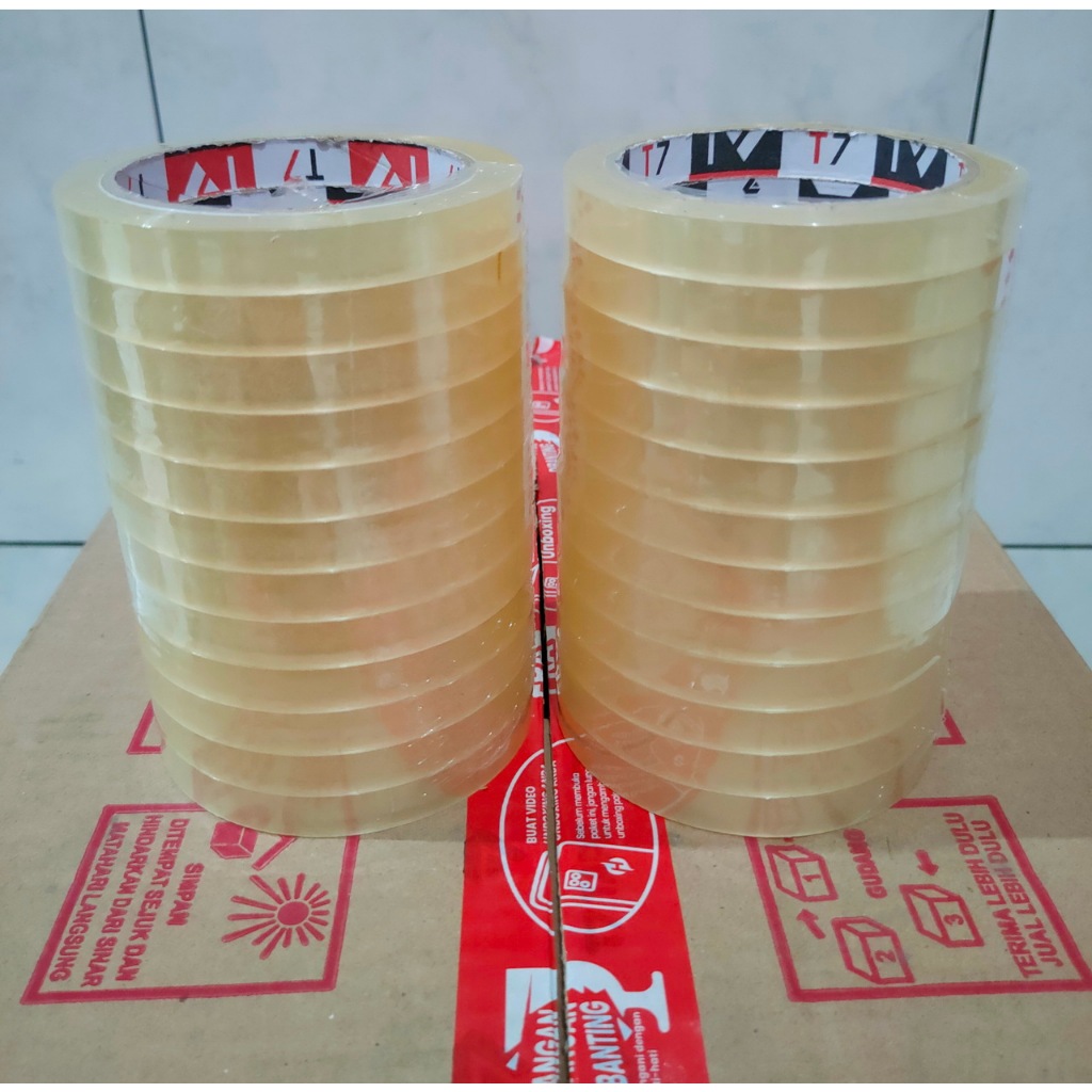 

Selotip Lakban 1/2 Inch 1 Slop Isi 12 Roll 12mmx90Yard Isolasi Bening Selasiban Transparan Kualitas
