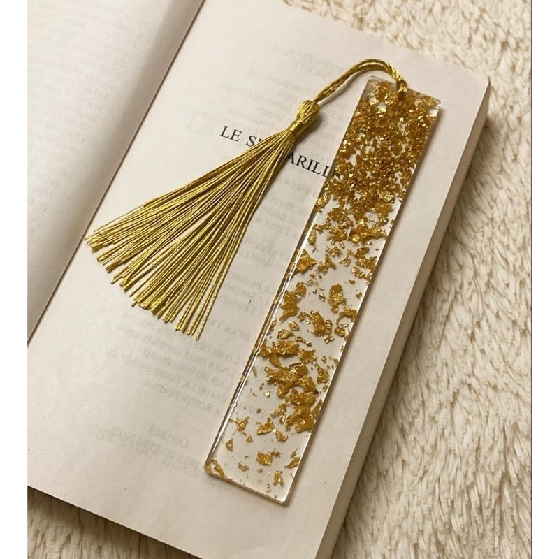 

CHOCOLATALK BOOKMARK RESIN PEMBATAS BUKU SPARKLING GOLD WITH TASSEL