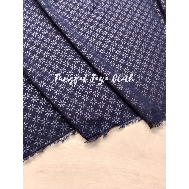 kain wolfis embos - wolfis embos motif matahari kecil - kain embos - embos