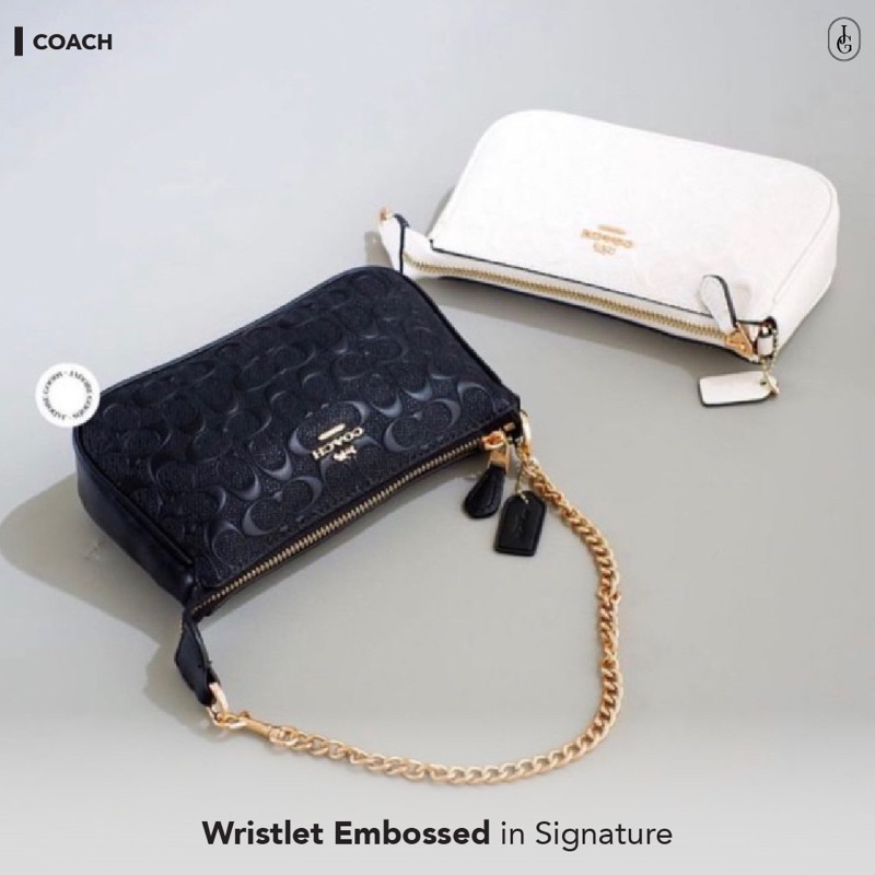 Coach Wristlet Embossed in Signature