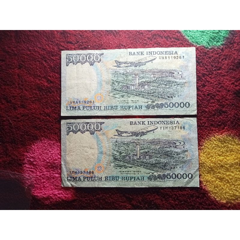 2 lembar 50000 suharto prefik bagus