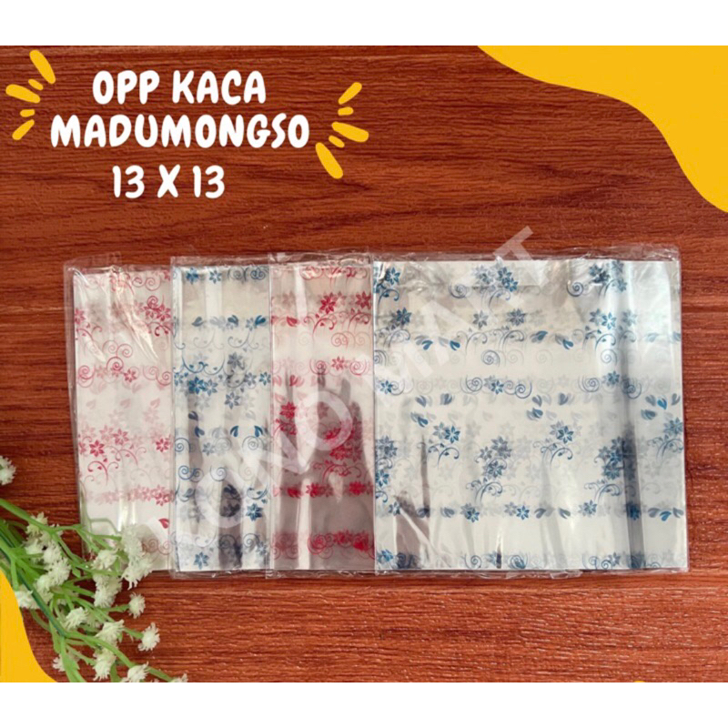 

Plastik Transparan potong Plastik Kaca Opp Madumongso 13x13 / Plastik Bening Motif Jenang