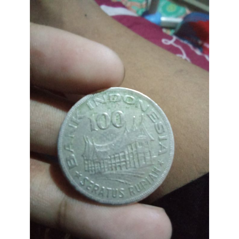 Uang koin 100 rupiah kuno taun 1978 wayang rumah gadang
