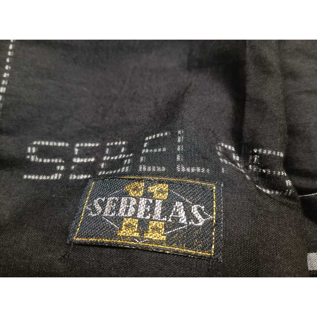 Sarung hitam sebelas rayon