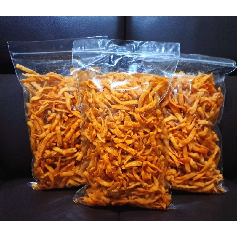 

SISTIK/ PANGSIT IRIS PEDAS & ASIN RENYAH GURIH TIPIS - 250 GRAM