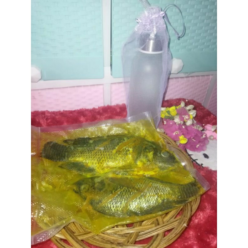 

Ikan Nila bumbu kuning