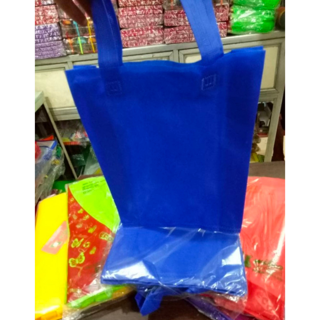

Tas spunbond polos pres handle lipat samping goodie bag belanja ultah souvenir seminar promosi warna