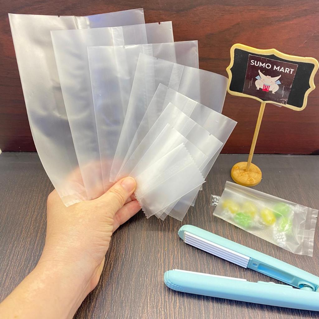 P2 - 100LEMBAR PLASTIK DOVE / PLASTIK SNACK / PLASTIK KUE POLOS / PLASTIK KUE KERING / PLASTIK MOONC