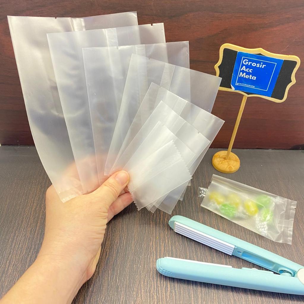 P2 - 100LEMBAR PLASTIK DOVE / PLASTIK SNACK / PLASTIK KUE POLOS / PLASTIK KUE KERING / PLASTIK MOONC