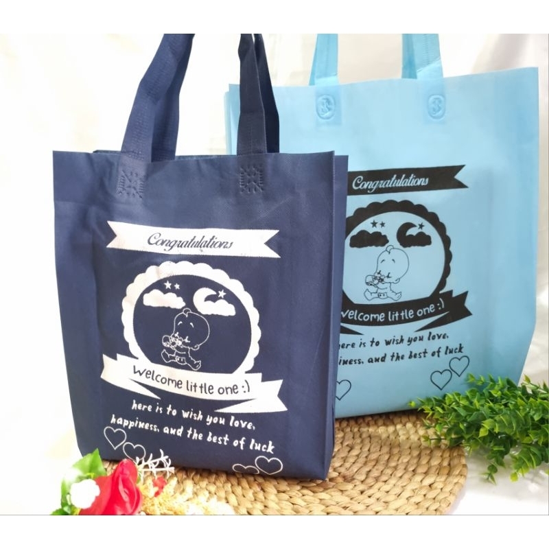

Goodie bag hampers bayi warna / tas spunbond lipat kado baby sablon