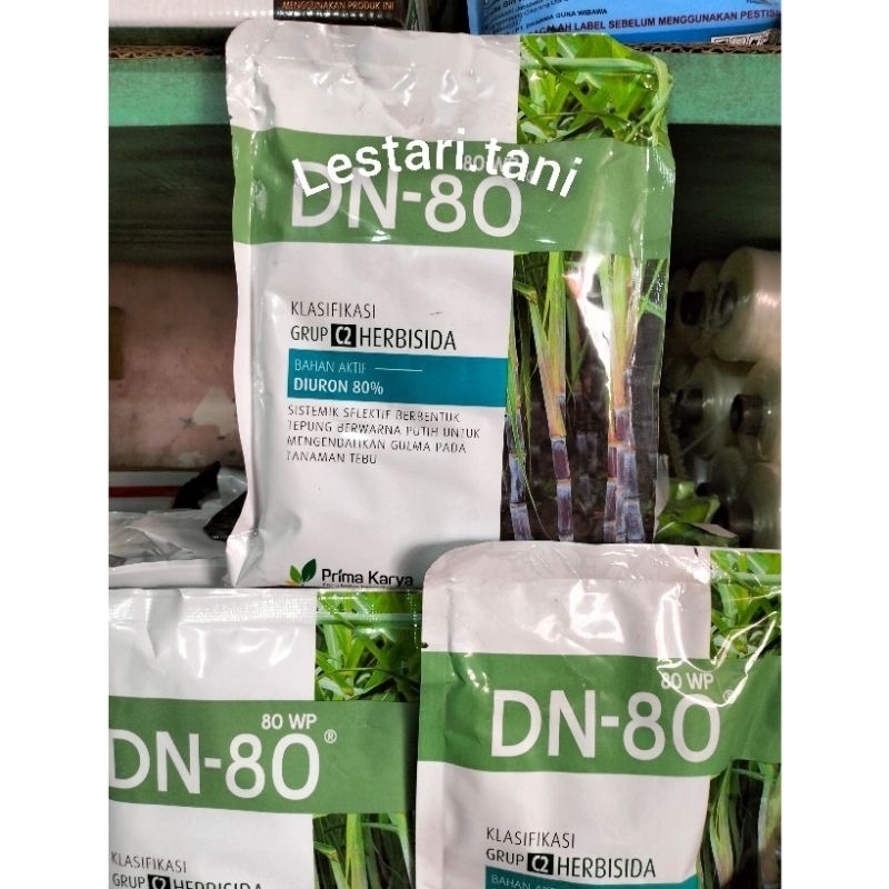 ￼Herbisida Sistemik DN-80 bahan aktif : diuron 80 % (200 gr) pembeku biji rumput