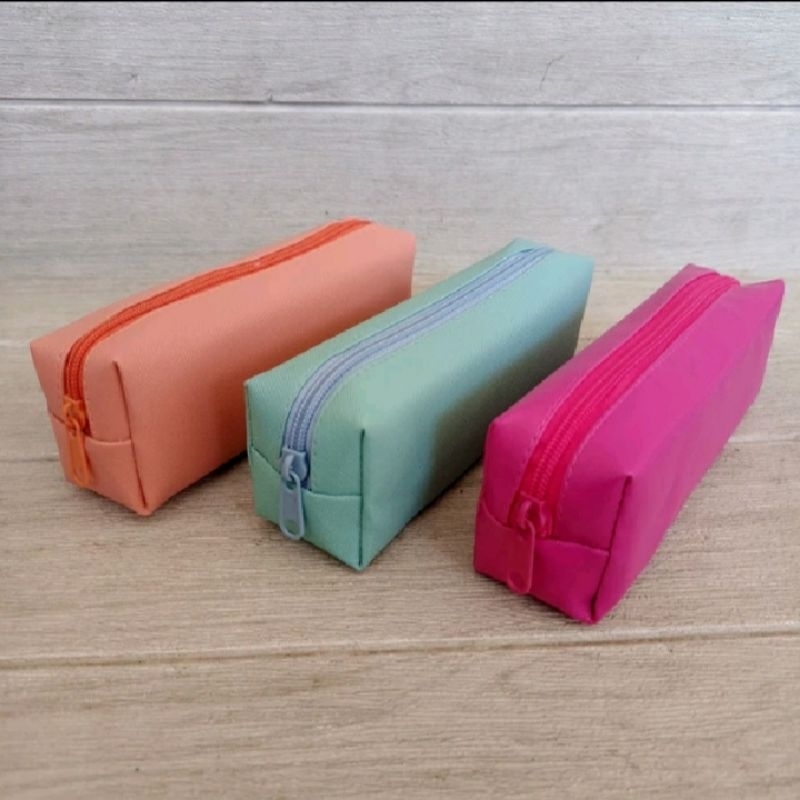 

Tepak pensil lontong polos warna pastel