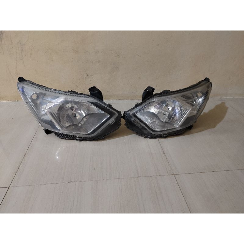 lampu depan calya,Sigra original koito