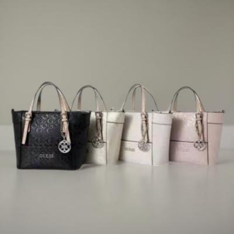 tas delaney mini clutch hologram