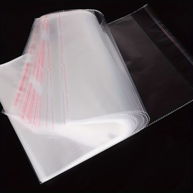 

RB 28X35 04 15 MICRON 1RIM = 500 PCS PLASTIK OPP SEAL PACKING BAJU GARMEN