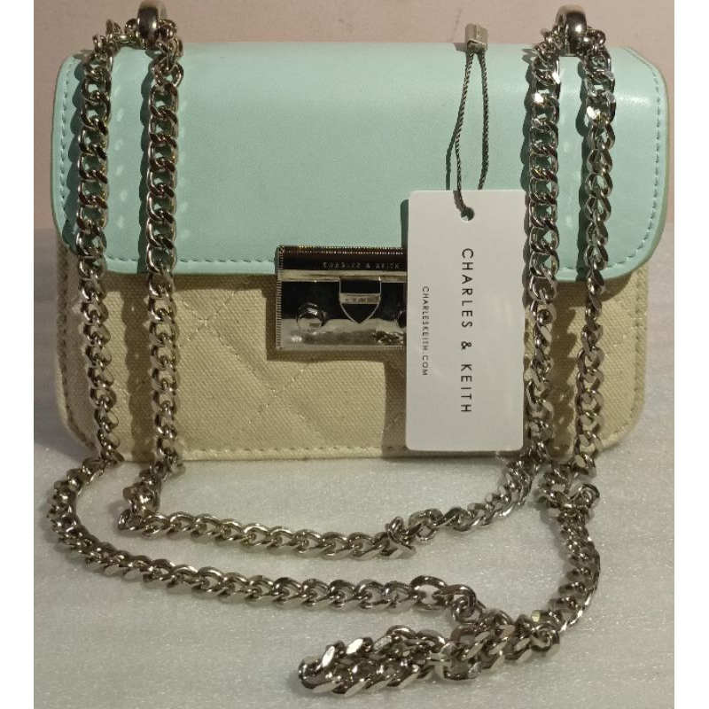 TAS CK  PUSH LOCK CHAIN TWO TONE