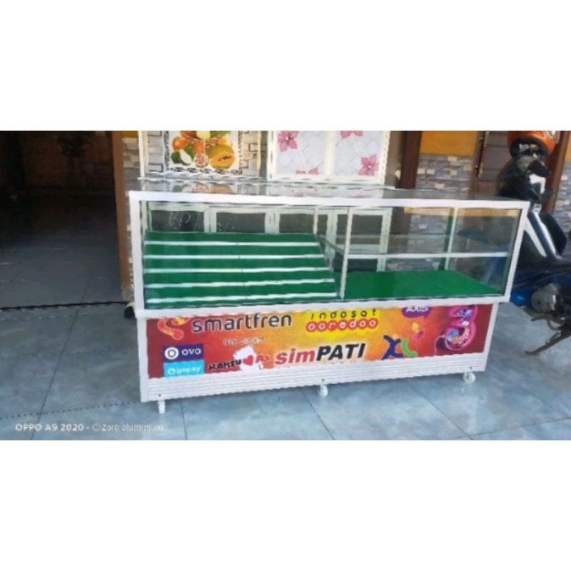 Etalase konter rak konter satu koma lima mtr