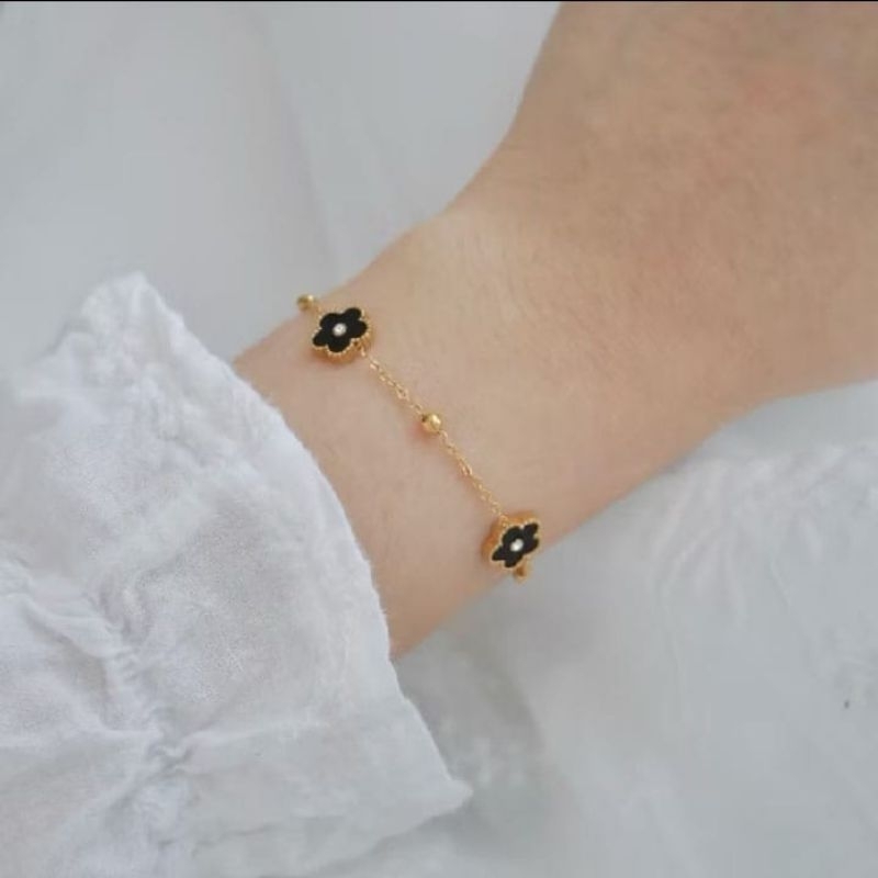 f1 gelang jedar bunga hitam putih titanium asli ctm