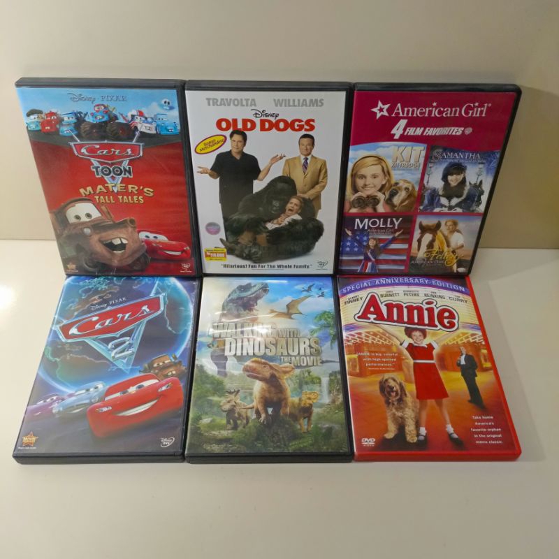 Kaset film dvd cars l old Dog l American girl l walking dinosaurs l Annie