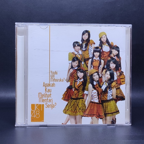 CD JKT48 - YUUHI WO MITEIRUKA? APAKAH KAU MELIHAT MATAHARI SENJA