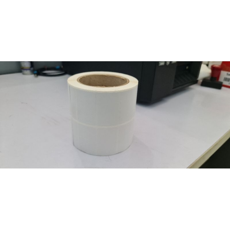

Label semi coeted uk 50x30mm 1roll/isi 2000pcs core 3inci( 2 line)