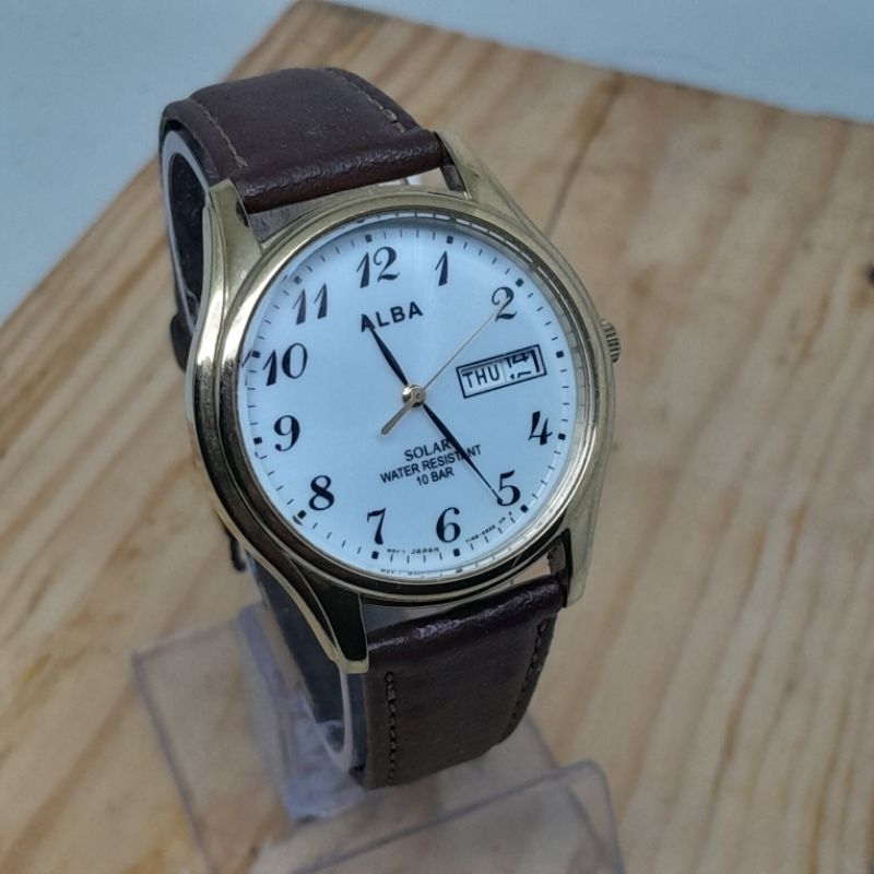 Jam tangan original Alba solar gold tone V158 0AX0