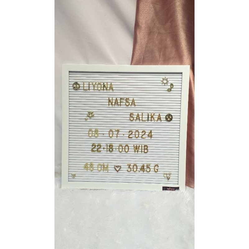papan nama bayi
