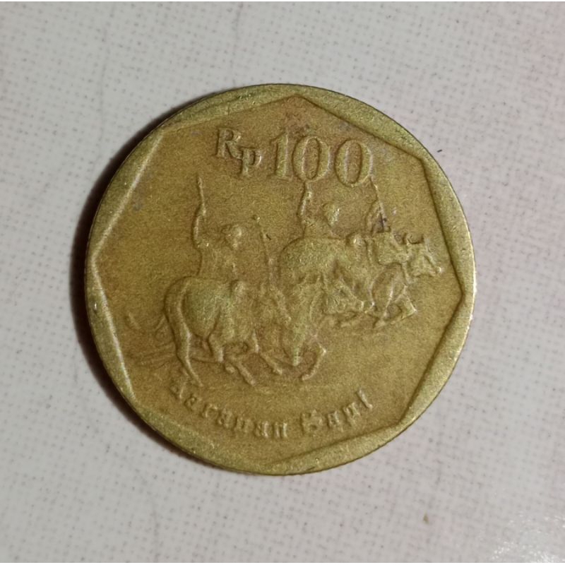 Koin kuno 100 rupiah karapan sapi