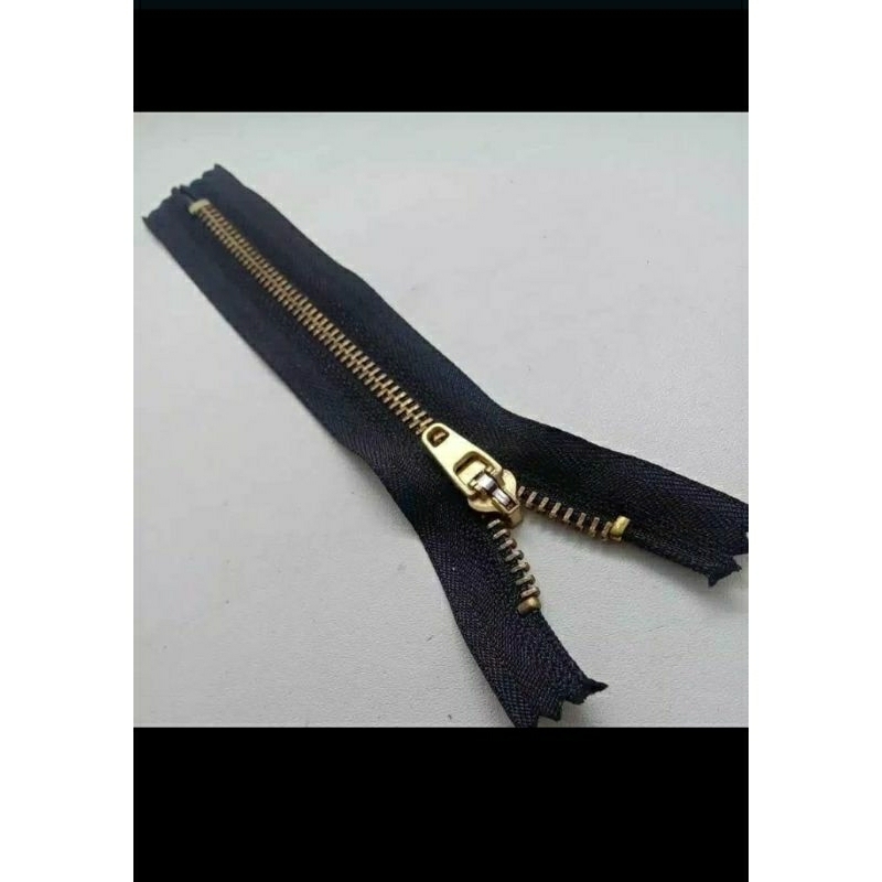 RESLETING CELANA JEANS