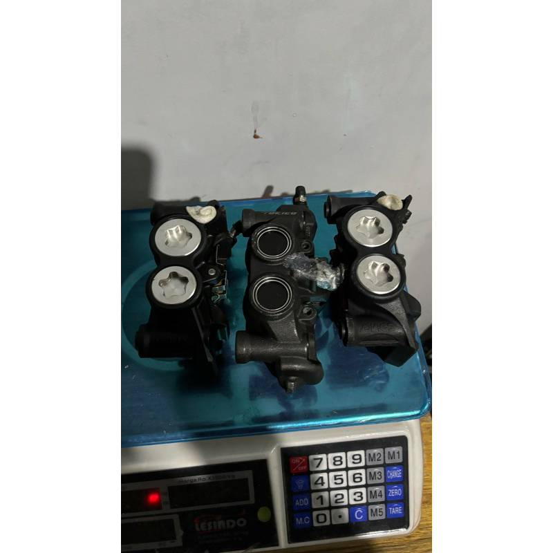 kaliper tokico kacamata