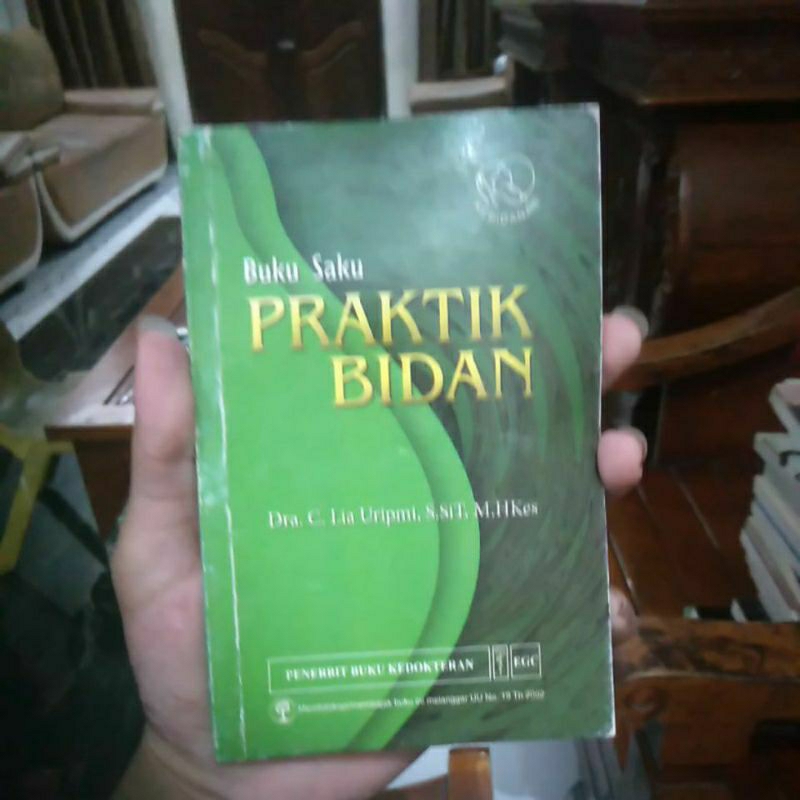 Buku saku praktik bidan