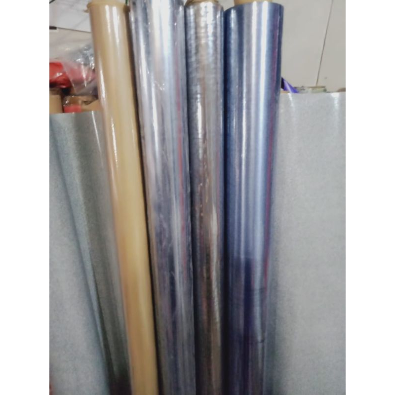 

Plastik Mika Transparan Bening Sampul Meja Pembungkus Souvenir