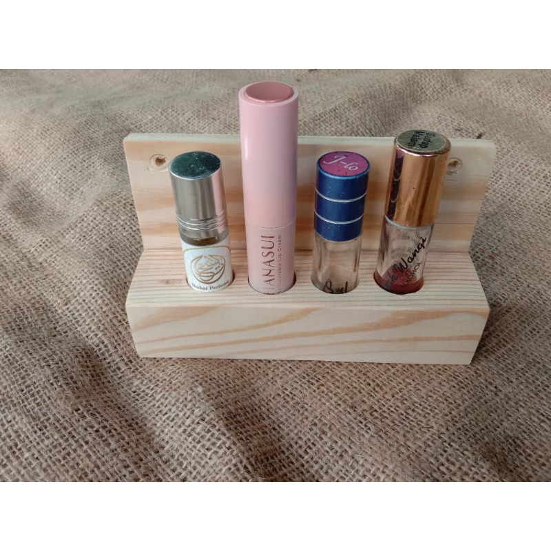 tatakan parfum gantung dinding /rak parfum gantung dinding