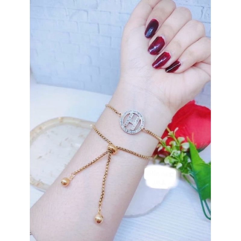 Gelang serut motif H bulat permata titanium fashion wanita