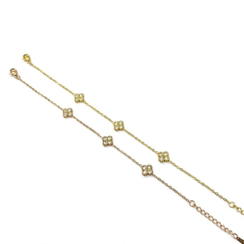 Gelang clover mata putih titanium fashion wanita