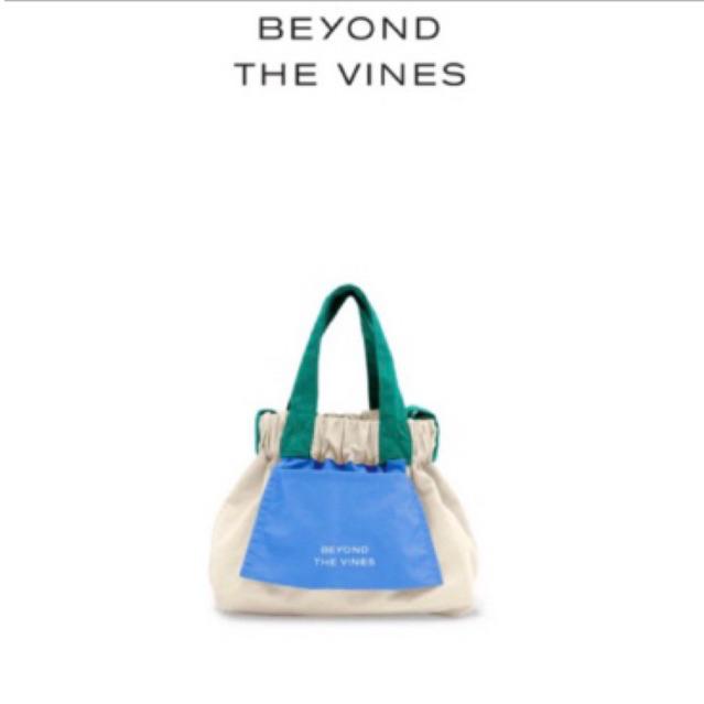 beyond the vines micro dumpling bag color cream blue