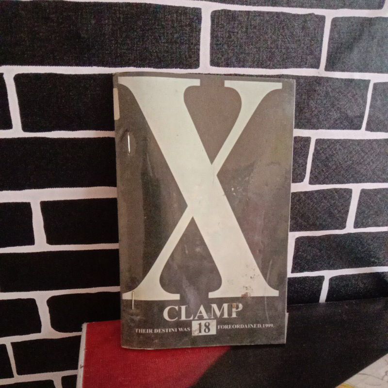 Komik X Clamp