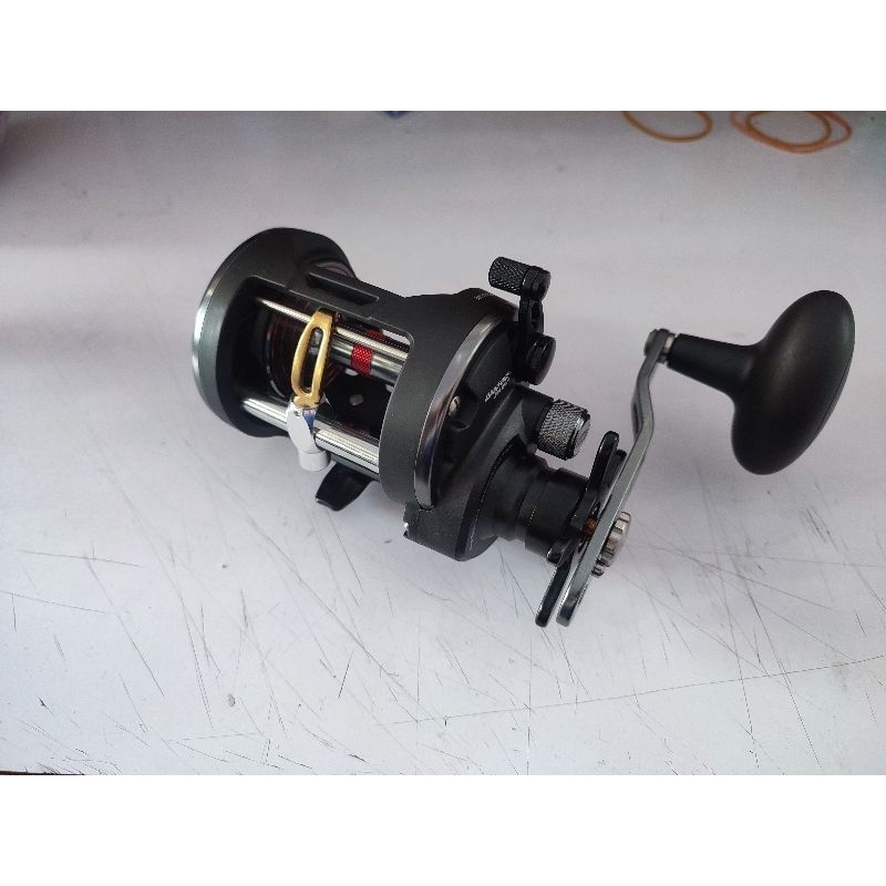 Reel Overhead OH Penn Warfare 20 LWLH handle kiri