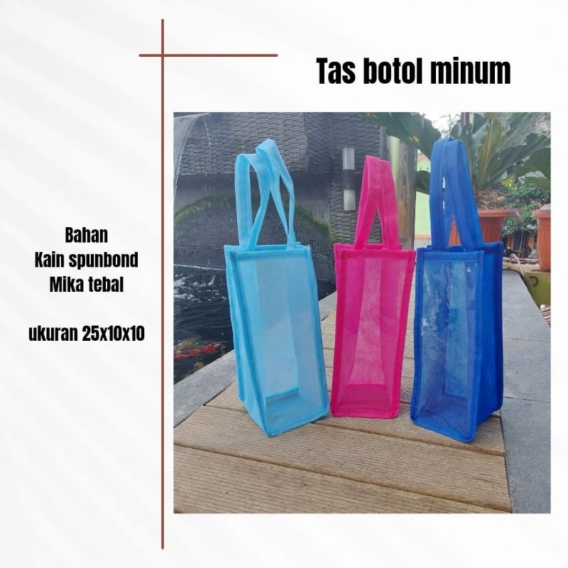 

Tas botol minum/ Tas kemasan botol/ bahan kombinasi spunbond dan mika ukuran 25x10x10