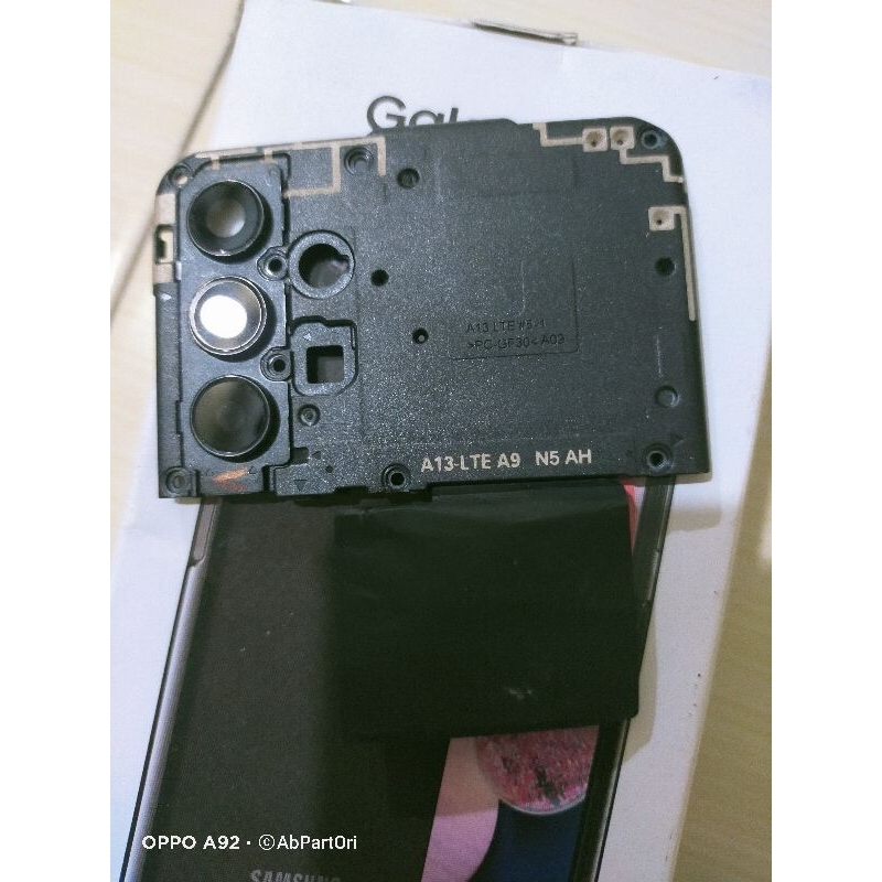 tutup mesin kamera samsung a13