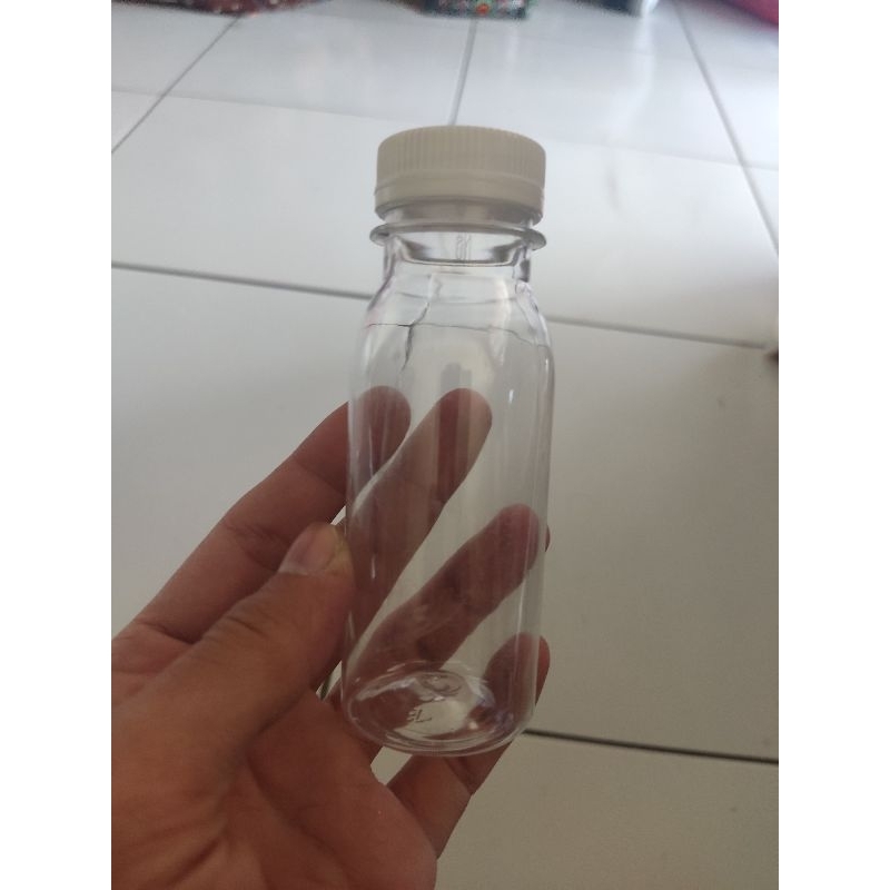 botol 100ml bening tutup segel