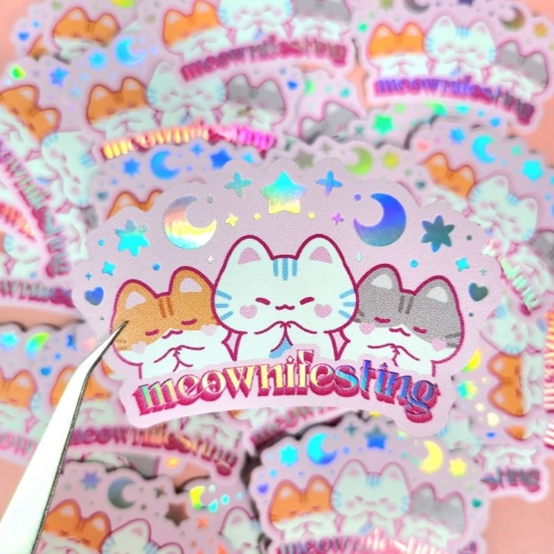 

Leendoodles - Gwenchana Meownifesting Overworked Holo Stickers