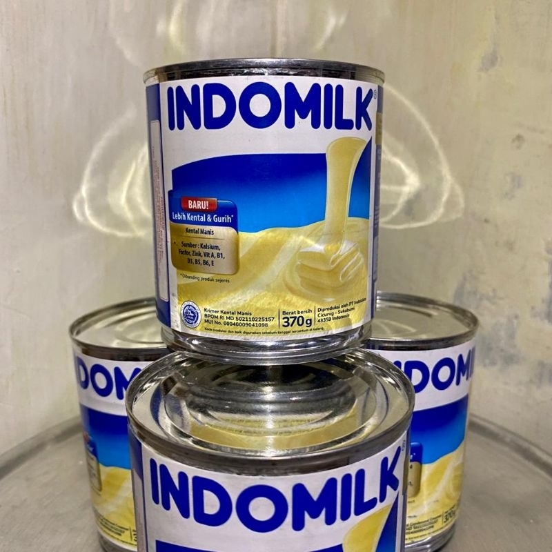 

SUSU INDOMILK PUTIH KALENG 370g / susu kental manis